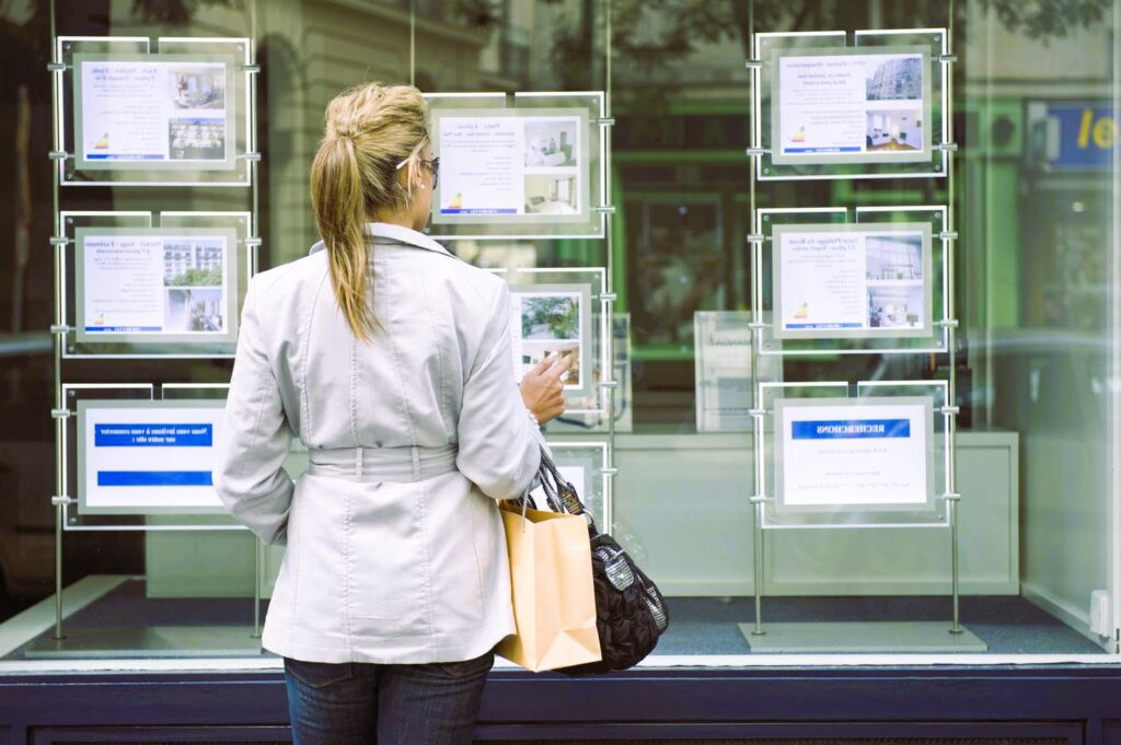 Girl looking at real estate ads